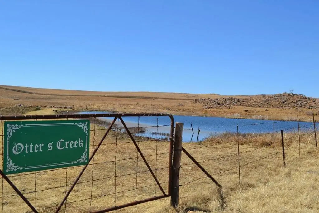 Farm dam and cottage at Dabchick near Dullstroom